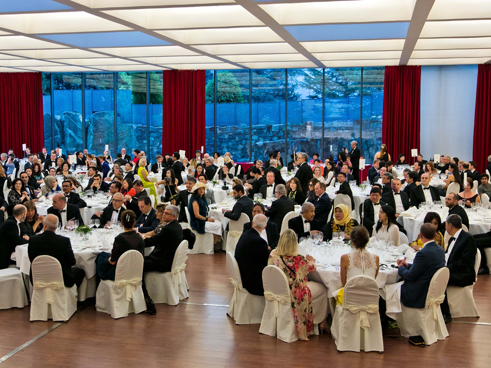 Large group of people at a gala dinner.